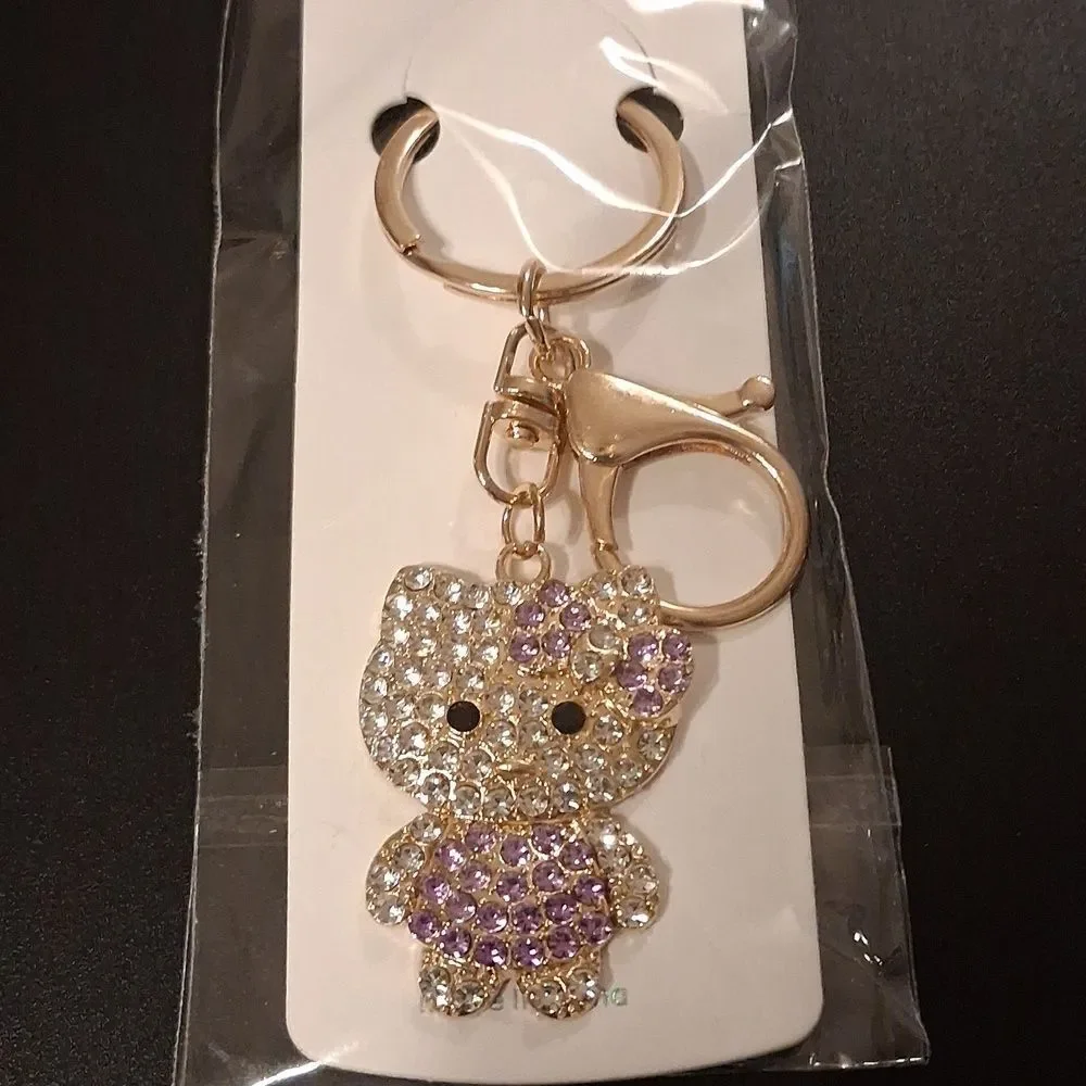 Hello Kitty Purple And White Rhinestone Keychain With Goldhardware. New In Packa